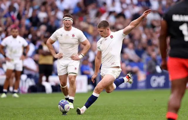 Owen Farrell of England kicks a penalty