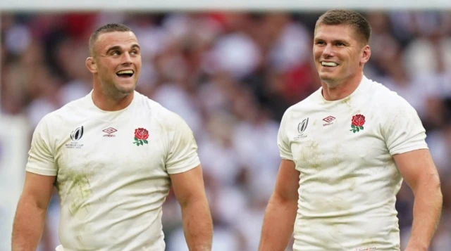 Ben Earl and Owen Farrell smile on the pitch