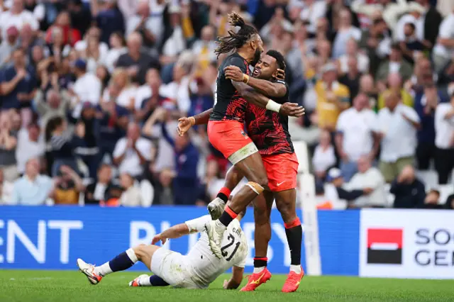 Vilimoni Botitu of Fiji celebrates with Waisea Nayacalevu of Fiji