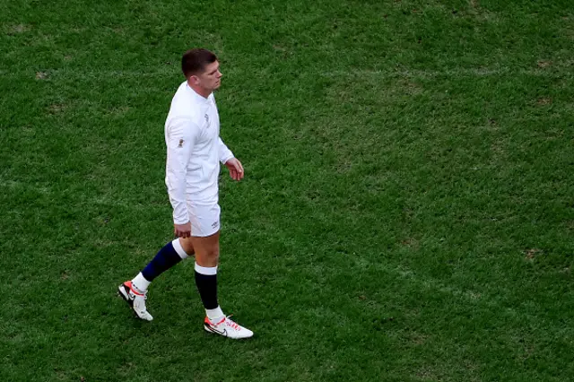 Owen Farrell of England takes to the field