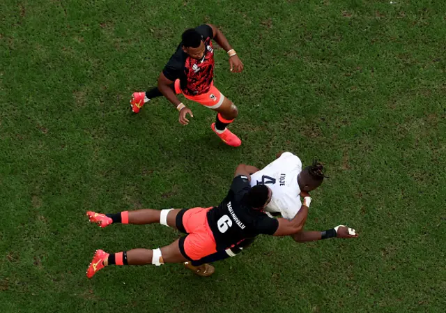 Maro Itoje of England is tackled by Lekima Tagitagivalu