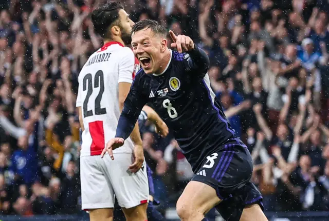 Callum McGregor running off in celebration