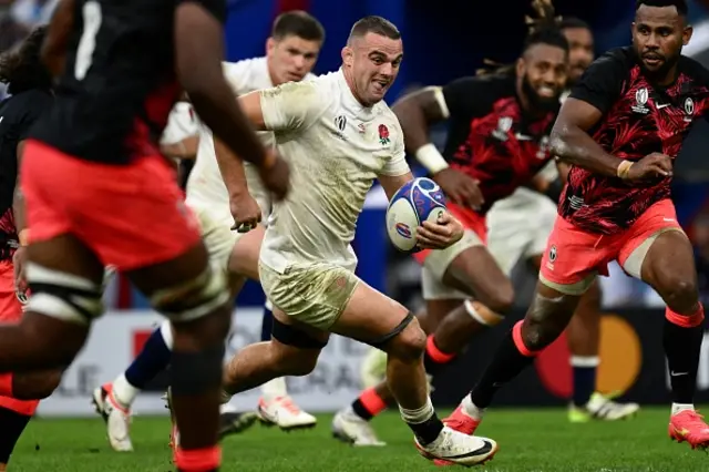 England's number eight Ben Earl runs with the ball