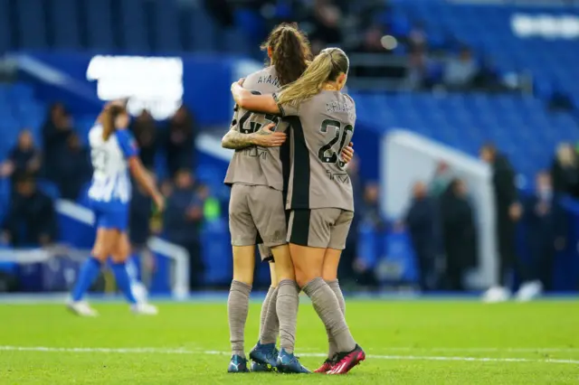 Ria Percival celebrates with teammates