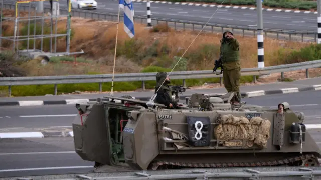 Israeli soldiers in a tank