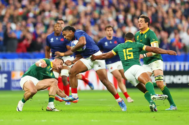 Peato Mauvaka of France is tackled by Jesse Kriel and Damian Willemse