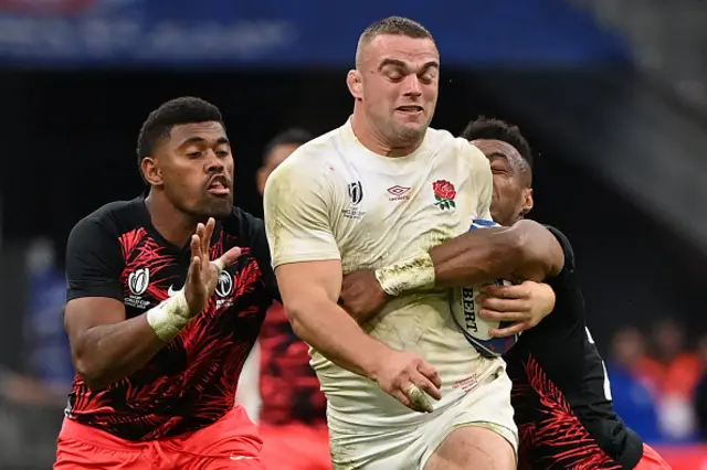 England's number eight Ben Earl is tackled