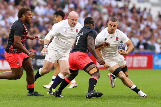 Ben Earl of England on the ball whilst under pressure from Levani Botia