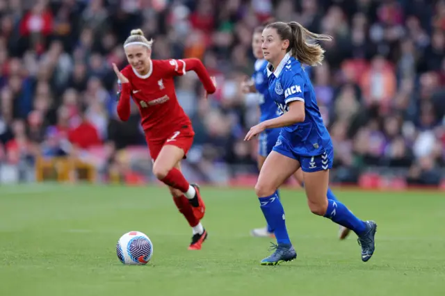 Clare Wheeler running with the ball