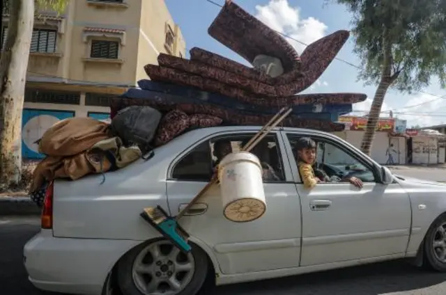 A family evacuates from Gaza City