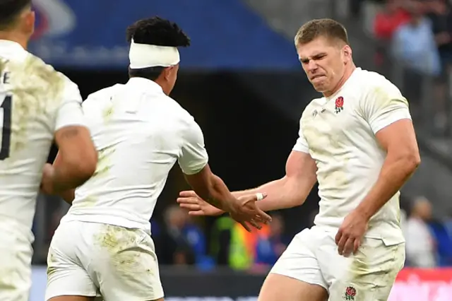 Owen Farrell and Marcus Smith high five