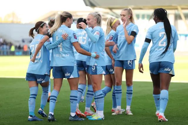 Laia Aleixandri of Manchester City celebrates with teammates