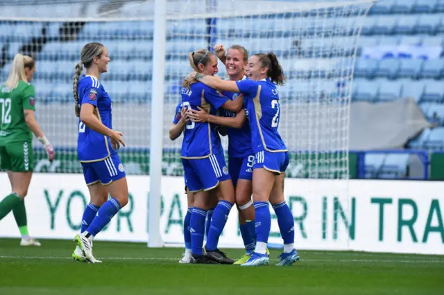 Leicester City women celebrate opening the scoring v Leicester.