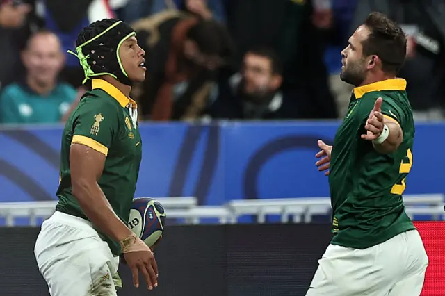 South Africa's wing Kurt-Lee Arendse celebrates with South Africa's scrum-half Cobus Reinach