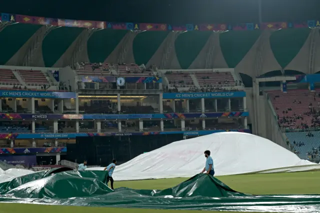 Covers come on at the Bharat Ratna Shri Atal Bihari Vajpayee Ekana Cricket Stadium, Lucknow during the Australia-Sri Lanka World Cup game