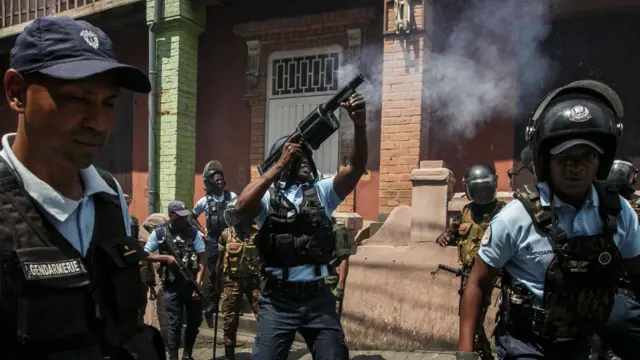 Anti-riot police officers fire teargas to disperse opposition supporters in Antananarivo on October 2, 2023. Madagascar's outgoing president and candidate for re-election on November 9, 2023