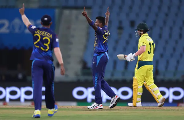 Dilshan Madushanka appeals for the wicket of David Warner