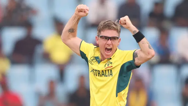 Adam Zampa celebrates taking a wicket