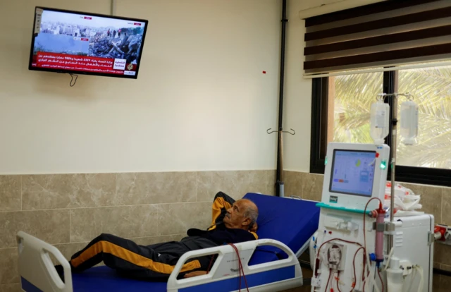 A Palestinian kidney patient lies on a hospital bed, as health officials say they are running out of fuel to operate dialysis devices, amid the ongoing Israeli-Palestinian conflict, at Naser hospital in Khan Younis