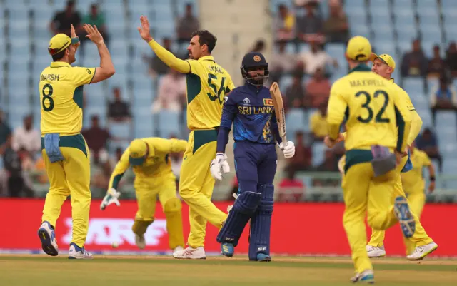 Mitchell Starc celebrates the wicket of Dhananjaya de Silva