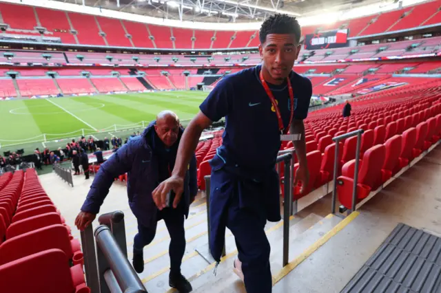 Bellingham reaches the top of the lower tier at Wembley.