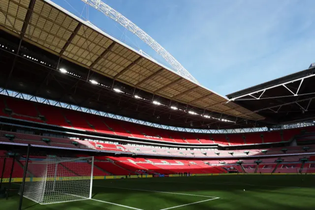 Wembley stands ready in the autumn sunshine.