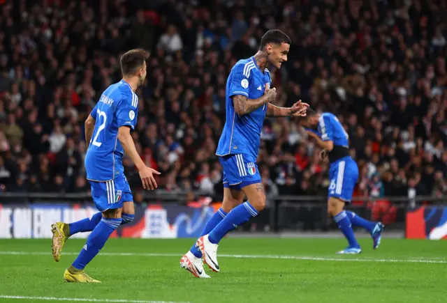 Scamacca celebrates opening the scoring for Italy,