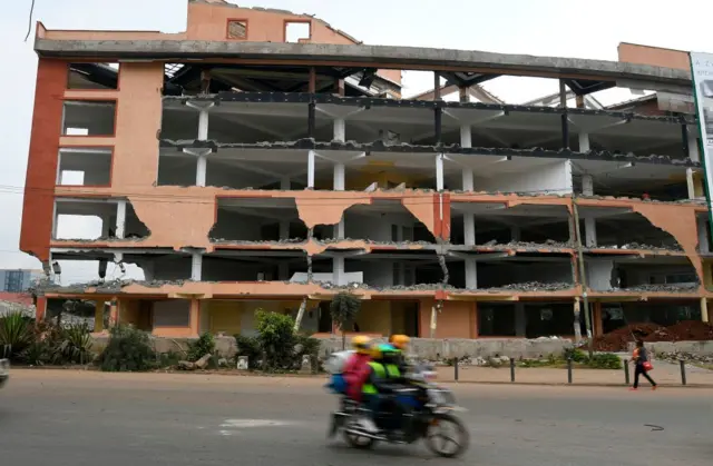 A a view of partly demolished South End mall, taken on August 31, 2018 in Nairobi. - South End Mall is among thousands of buildings marked for demolition, for being illegally built on riparian land which Article 67 of the Constitution states is public land.