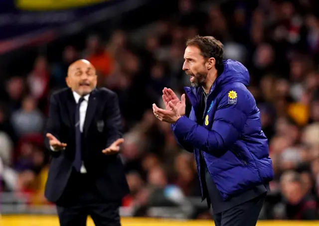 Southgate applauds from the sidelines.