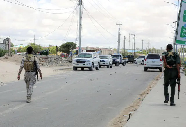 Somali security forces inspect the site of a suicide car bomb attack in Mogadishu, Somalia on August 22, 2023.