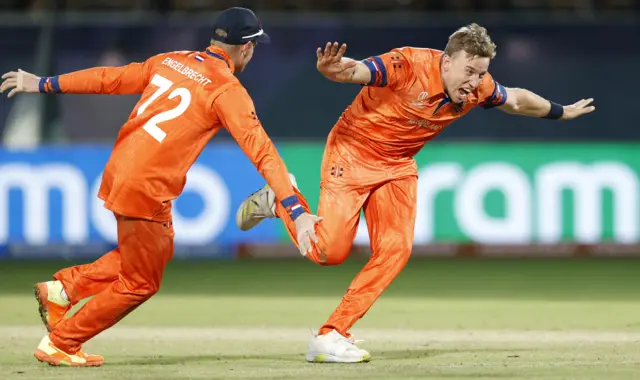 Logan van Beek celebrates the wicket of David Miller