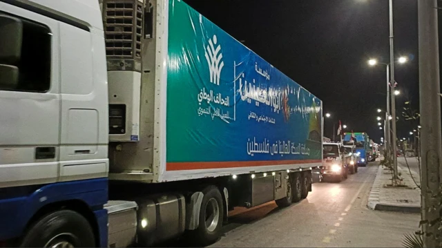 A convoy of trucks carrying humanitarian aid from Egyptian NGOs for Palestinians start to move from Al-Arish to Rafah city as they wait for an agreement on the opening on the Rafah border crossing to enter Gaza, amid the ongoing conflict between Israel and Hamas, in the city of Al-Arish, Sinai peninsula, Egypt, October 17, 2023.