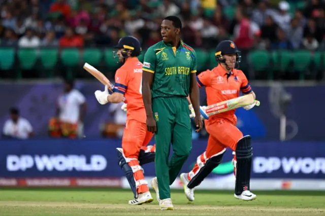 Kagiso Rabada looks on as the Netherlands run between the wickets