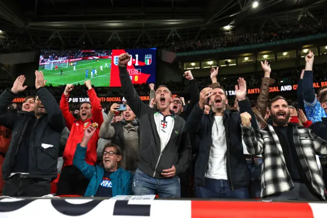 England fans celebrate the team's qualification for Euro 2024