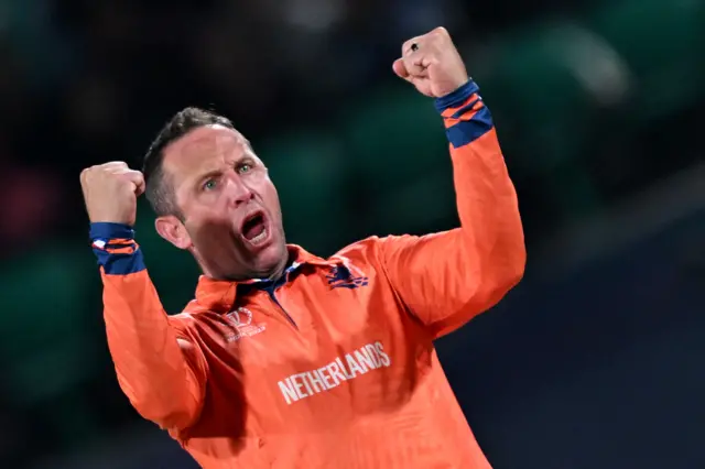 Roelof van der Merwe celebrates taking a wicket