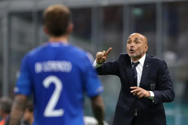 Spaletti shouts instructions onto the pitch from the sidelines.