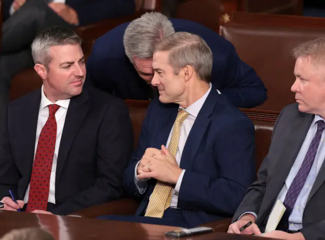 U.S. Rep. Jim Jordan (R-OH) (C) talks to former Speaker of the House Kevin McCarthy (R-CA) as the House of Representatives votes on a Speaker of the House at the U.S. Capitol Building on October 17,