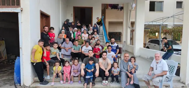 Some of the people staying in Ibrahim AlAagha's parents' house in Khan Younis