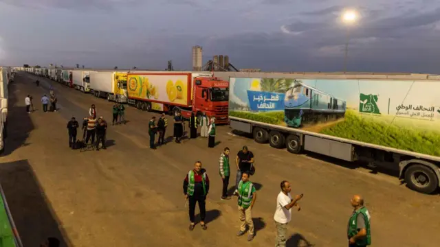 Aid convoy trucks are seen at Rafah border