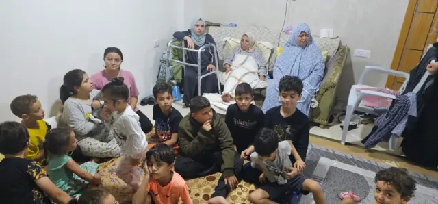 People pictured inside the family home of Ibrahim AlAgha