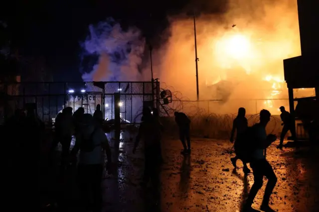 Protesters clash with Lebanese security forces on October 18, 2023, outside the US Embassy