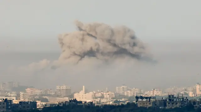 Smoke rises from the northern part of the Gaza Strip as a result of an Israeli airstrike on Wednesday morning