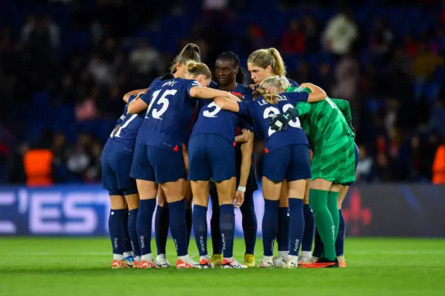 PSG players in a huddle