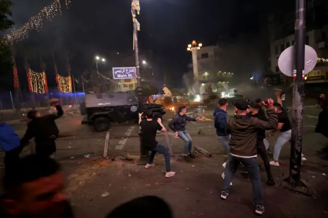 Protesters clash with Palestinian security forces in Ramallah, West Bank