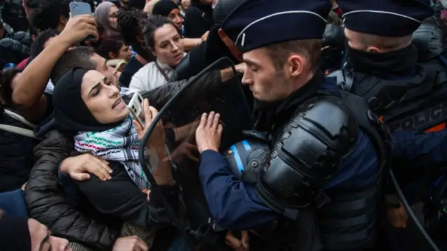 French riot police intervene against demonstrators during a pro-Palestinian rally at the Republique Square in Paris, France on October 14, 2023