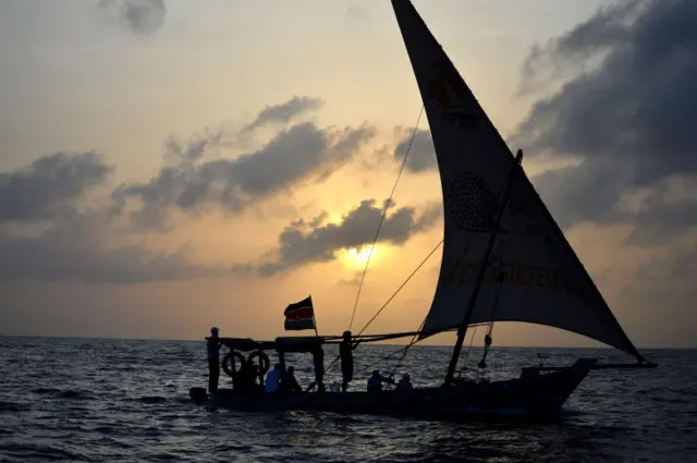 A boat made from recycled materials sails off the coast of Mombasa, Kenya, in 2019.