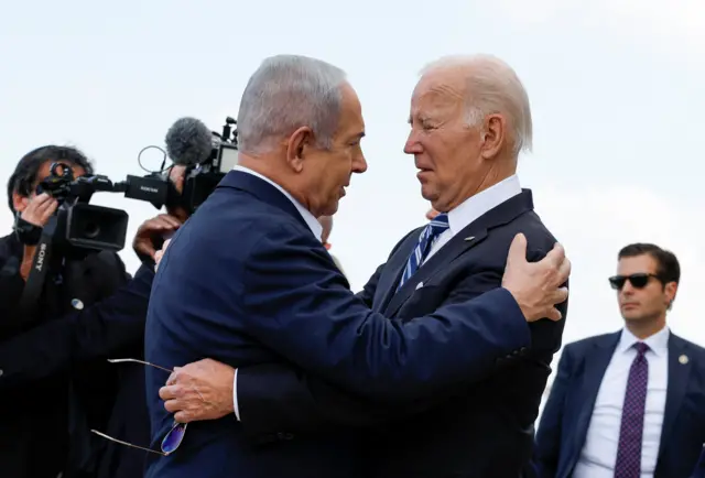 Benjamin Netanyahu and Joe Biden embrace