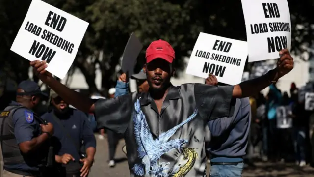 eople demonstrate for electricity and other issues outside the Cape Town Convention Centre during the African Energy Week in Cape Town, South Africa - 17 October 2023