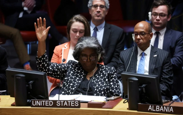 US Ambassador to the United Nations Linda Thomas-Greenfield votes against a Brazil-sponsored draft resolution during a meeting of the United Nations Security Council on the conflict between Israel and Hamas at U.N. headquarters in New Yor