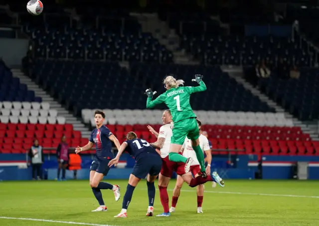 Leah Galton challenges for ball